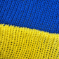 Close-up of blue and yellow knitted fabric