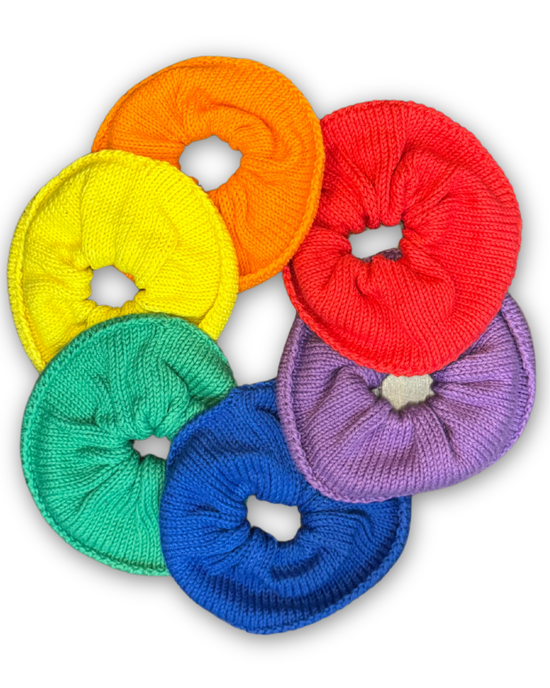 Colour options for made-to-order beanie: red, orange, yellow, green, blue and purple (shown as scrunchies)