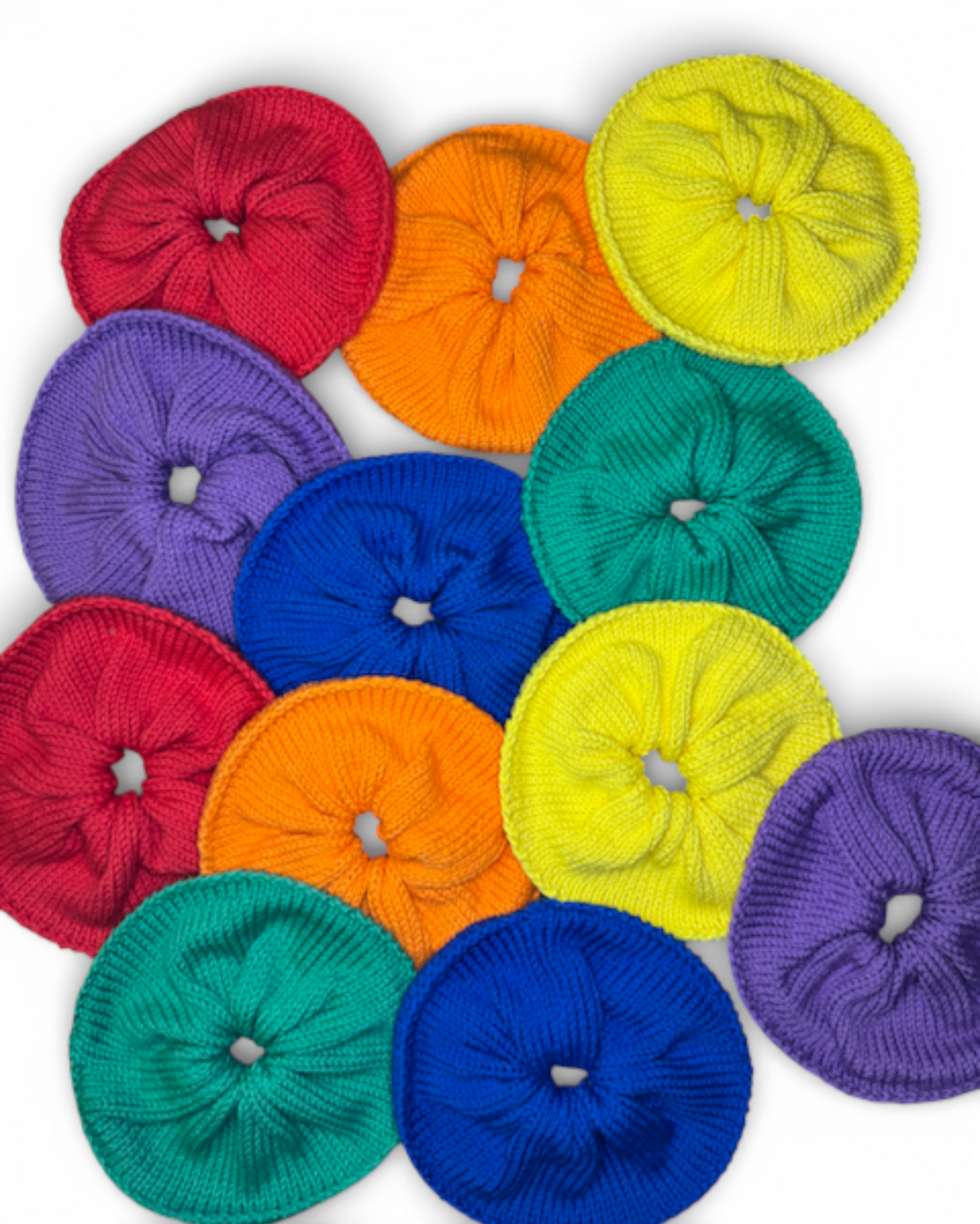 Colorful circular fabric scrunchies arranged in a circular pattern on a white background