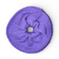 Purple knitted scrunchie on a white background