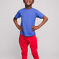 A boy wearing a blue t-shirt and red trousers - Hues Clothing